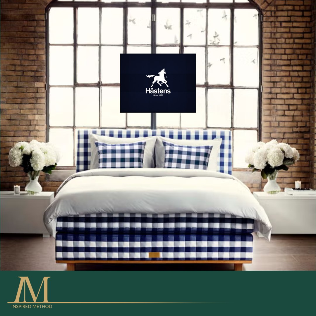Hastens bed in a well lit setting.
